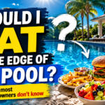 A burger, fries, fruit bowl, and iced drink sitting on the edge of a swimming pool with the text "Should I eat by the edge of my pool? What most pool owners don't know